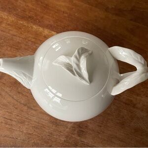 Elegant White Teapot with Leaf Design